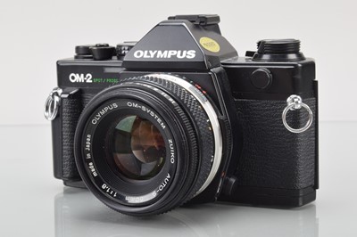 Lot 231 - An Olympus OM-2 Spot/Program SLR Camera