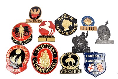 Lot 196 - A collection of plaster and cast metal reproduction firemarks