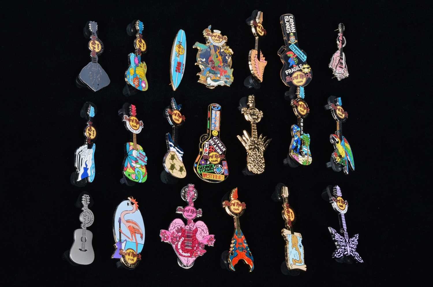 Lot 1 - A collection of twenty Hard Rock Café Cayman Islands pin badges
