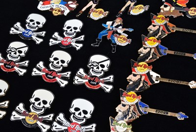 Lot 5 - A collection of eighteen Pirate week Hard Rock Café Cayman Islands pin badges