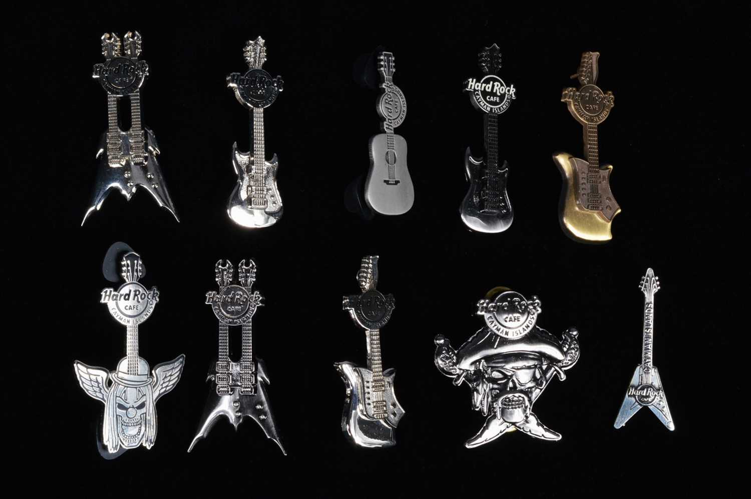 Lot 7 - A collection of ten chrome Hard Rock Café Cayman Islands pin badges