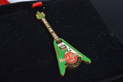 Lot 15 - A collection of twenty three marketing Hard Rock Café Cayman Islands pin badges