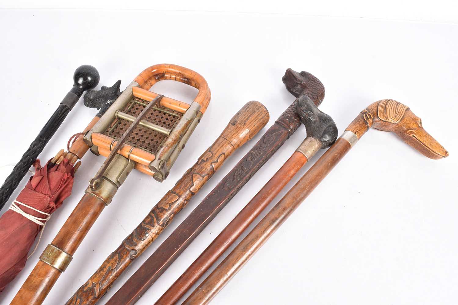 Lot 22 - A collection of five walking sticks