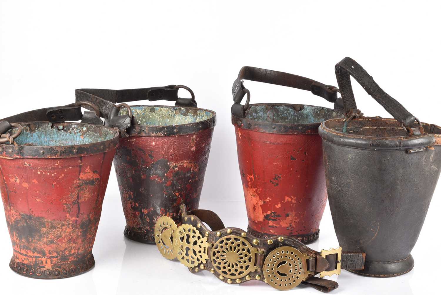 Lot 58 - A group of four vintage leather fire buckets