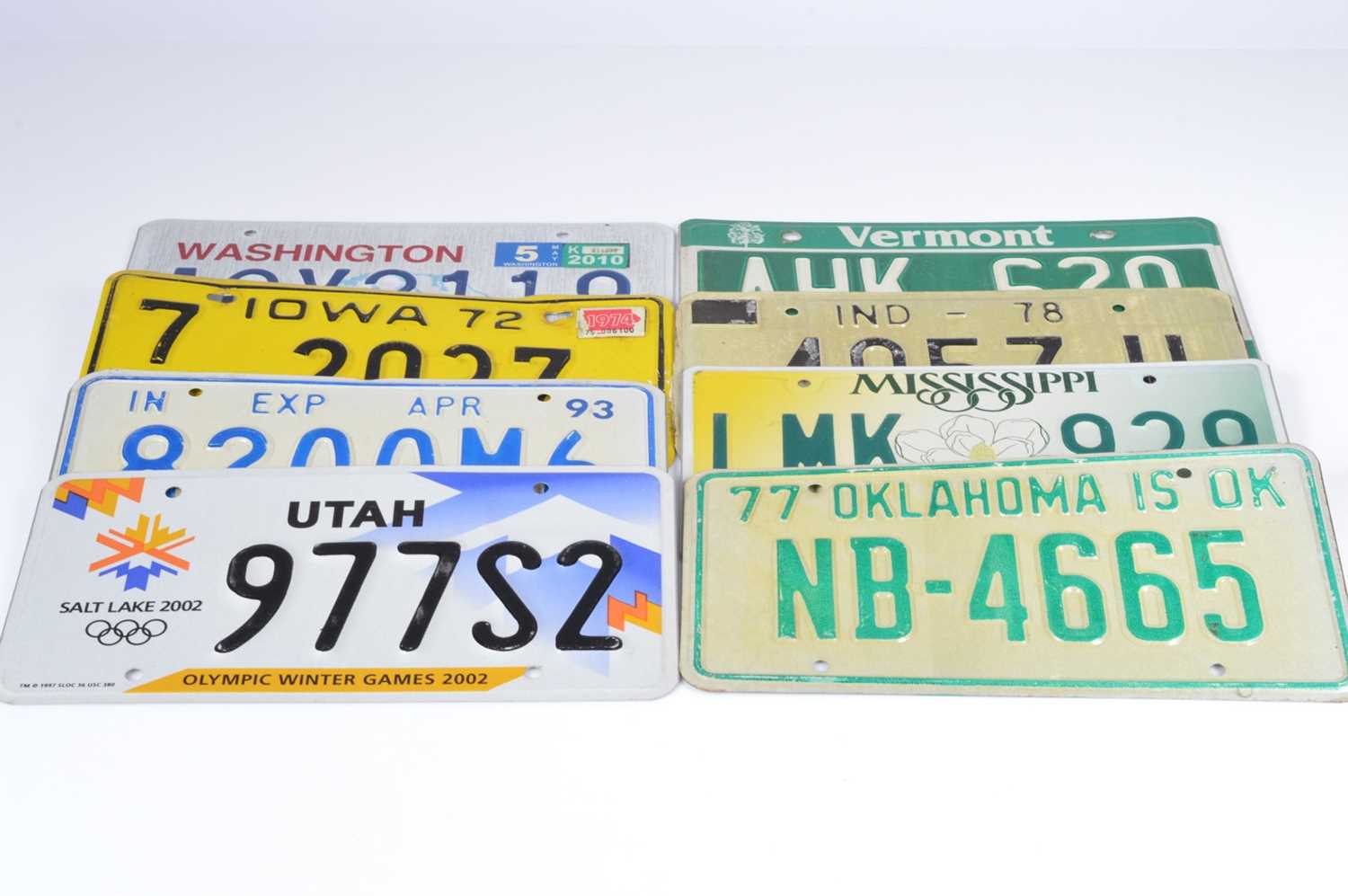 Lot 84 - A collection of eight vintage licence plates from various U.S states