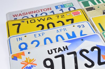 Lot 84 - A collection of eight vintage licence plates from various U.S states