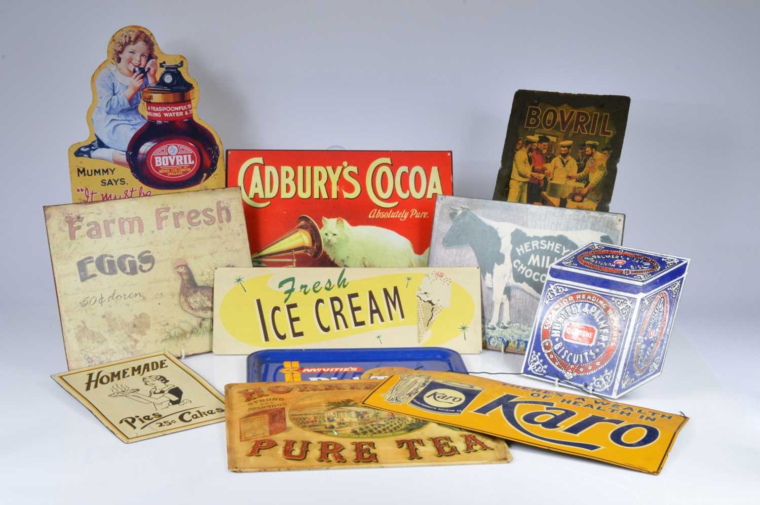 Lot 87 - A collection of grocery advertising signs