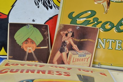 Lot 89 - A collection of eight large advertising signs.