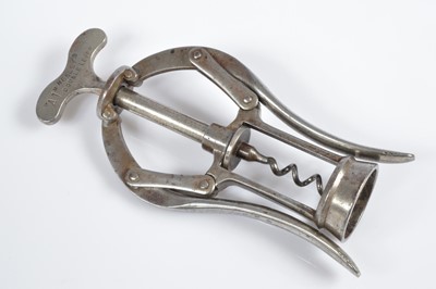 Lot 228 - A set of three corkscrews