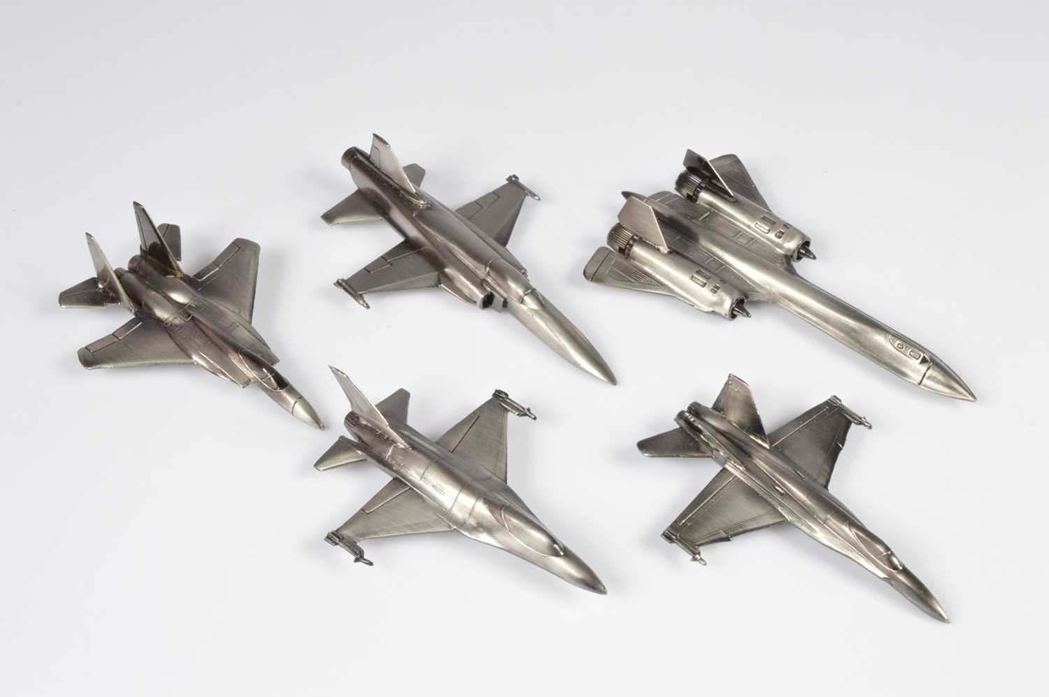 Lot 233 - A collection of five novelty fighter jet table lighters