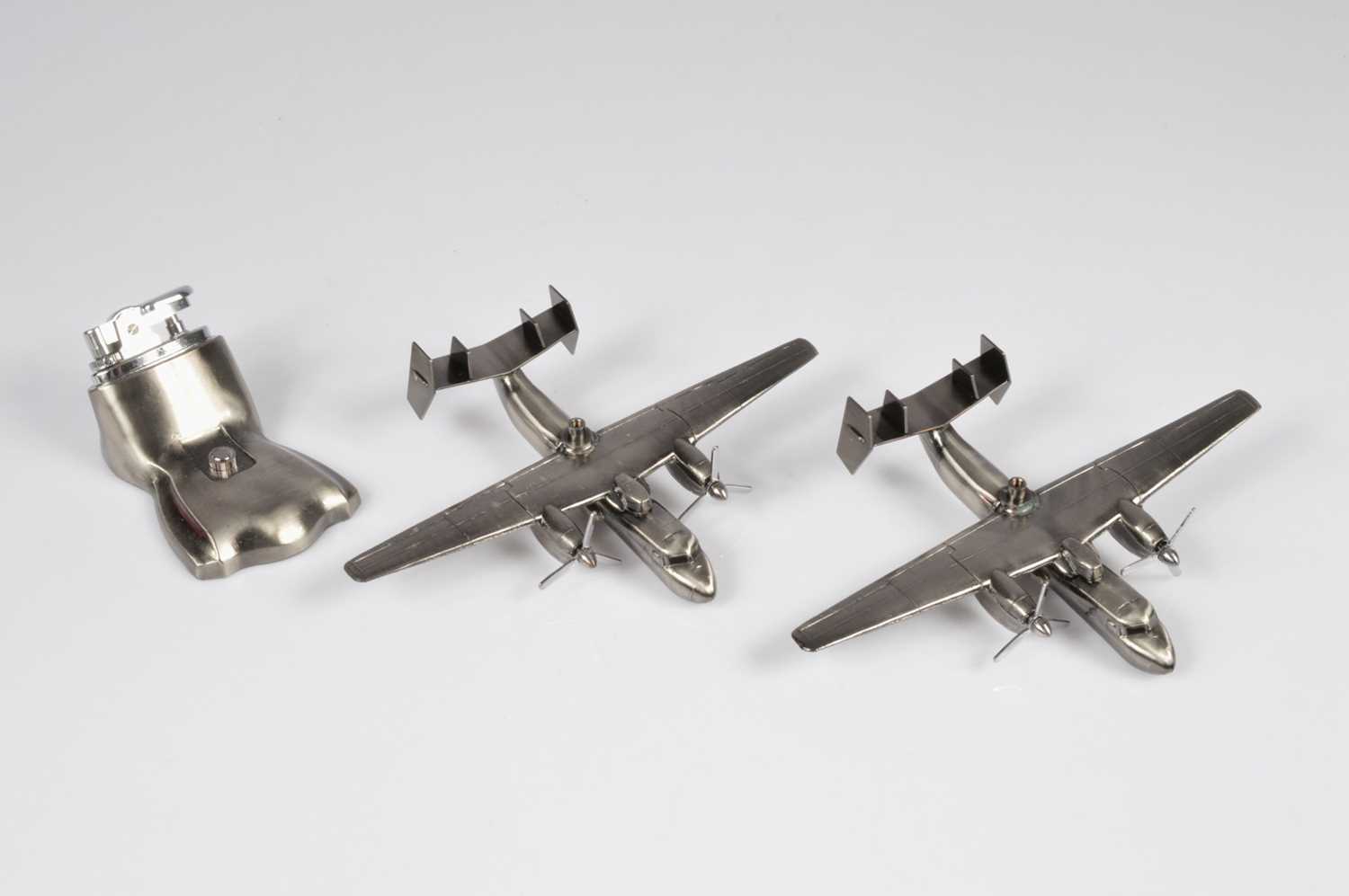 Lot 234 - Two novelty aircraft table lighters