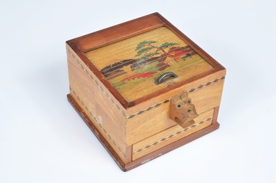 Lot 250 - A collection of five vintage middle and far eastern treen cigarette dispensers