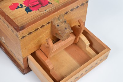 Lot 250 - A collection of five vintage middle and far eastern treen cigarette dispensers