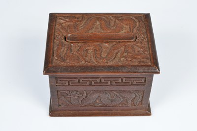 Lot 250 - A collection of five vintage middle and far eastern treen cigarette dispensers