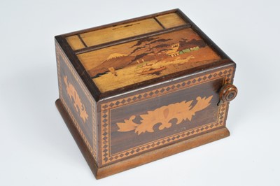 Lot 250 - A collection of five vintage middle and far eastern treen cigarette dispensers