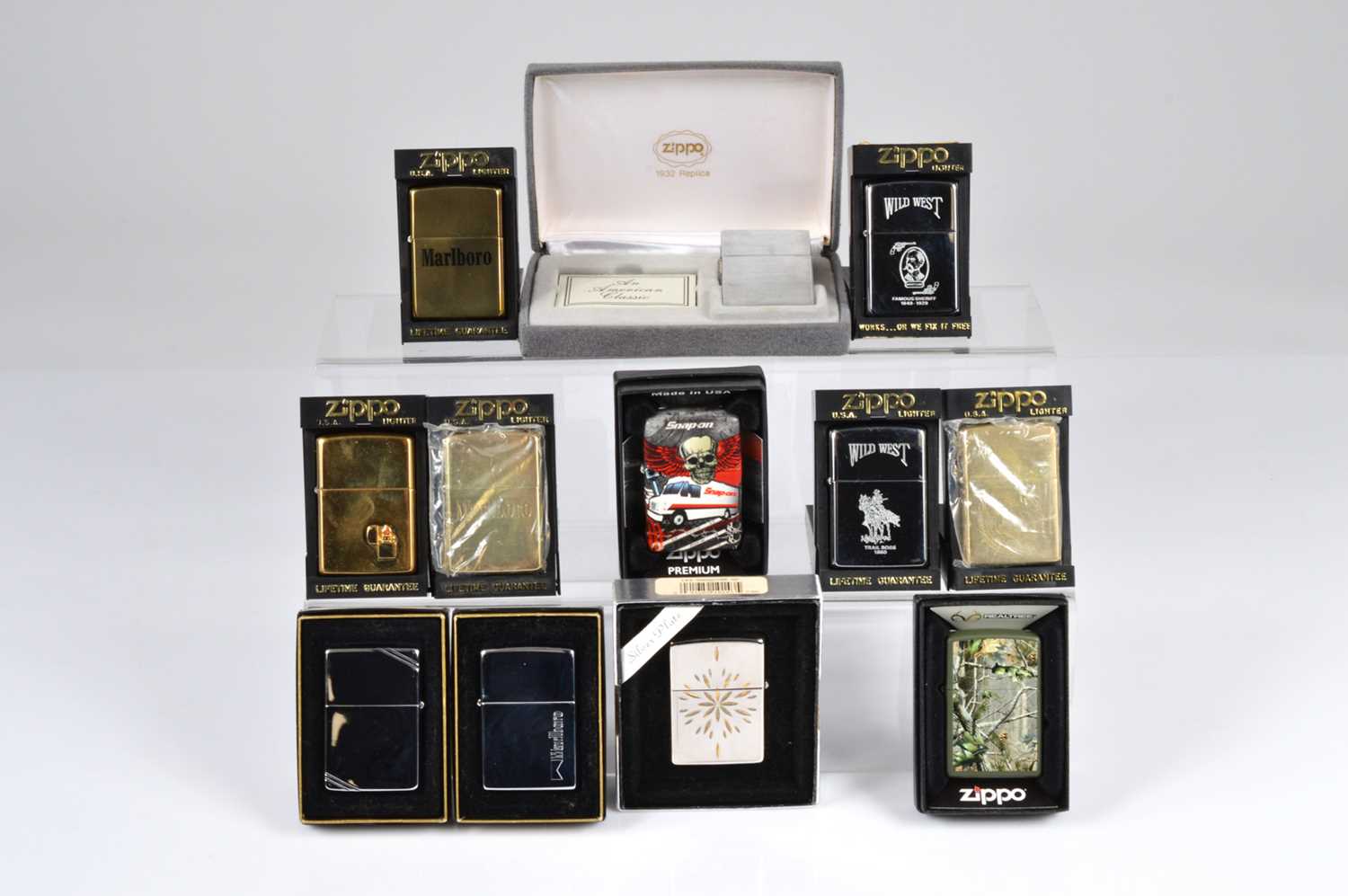 Lot 261 - A collection of unused Zippo Lighters