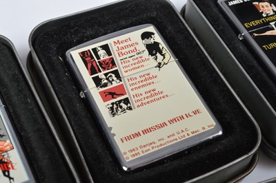 Lot 264 - A set of eight 1996 James Bond Film Zippo Lighters