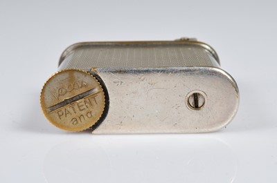 Lot 271 - A German Takolite Semi-Automatic Pocket lighter