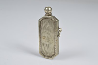 Lot 282 - A Cartier Ovale bi-metal pocket lighter