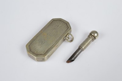 Lot 282 - A Cartier Ovale bi-metal pocket lighter