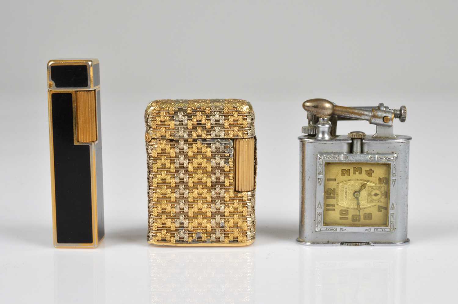 Lot 291 - An American Triangle Watch Pocket Lighter