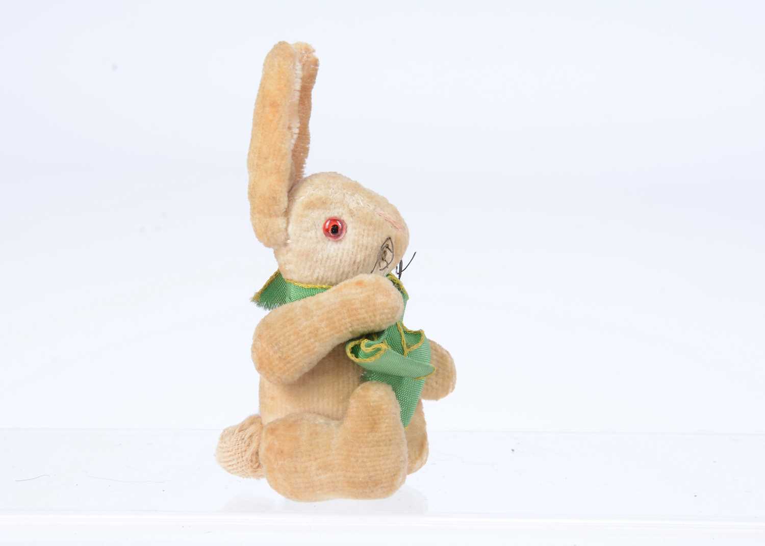 Lot 54 - A  1930s miniature velvet jointed rabbit