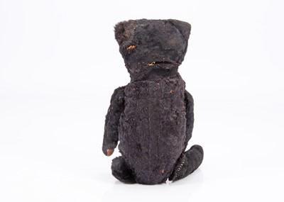 Lot 69 - An interest black teddy bear, circa 1915 -20