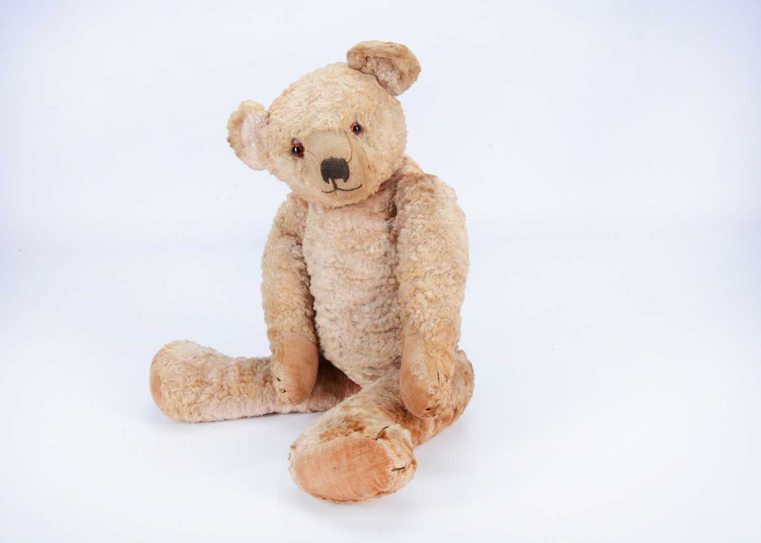 Lot 81 - A 1930s Omega pink art silk teddy bear