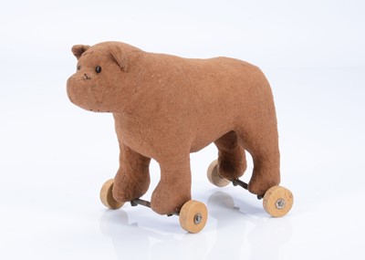 Lot 115 - A 1930s French bear on wheels