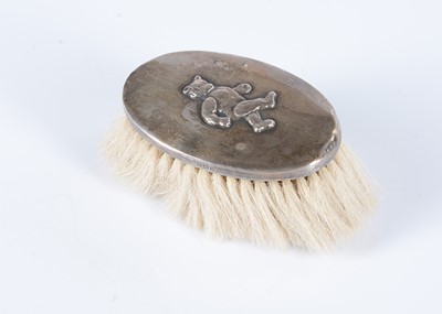Lot 127 - A Crisford & Norris hallmarked silver 1926 teddy bear brush