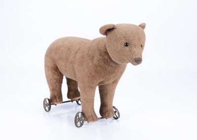 Lot 156 - An early Steiff centre-seam bear on wheels 1905-10