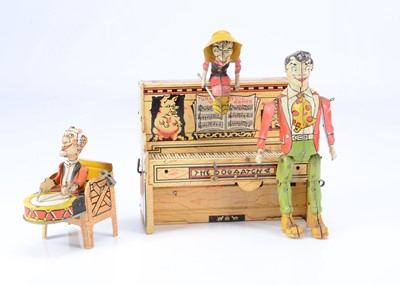 Lot 168 - An Unique Art clockwork lithographed tinplate ‘L’Il Abner and The Dogpatch Band’ toy