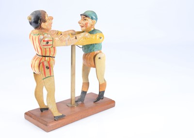 Lot 177 - A late 19th century Albin Amende Sonneberg jockey and clown wrestling toy