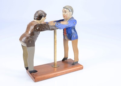 Lot 180 - An Albin Amende Sonneberg USA Presidential wresting toy, circa 1912