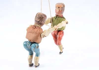 Lot 181 - A mid to late 19th century German wrestling toy