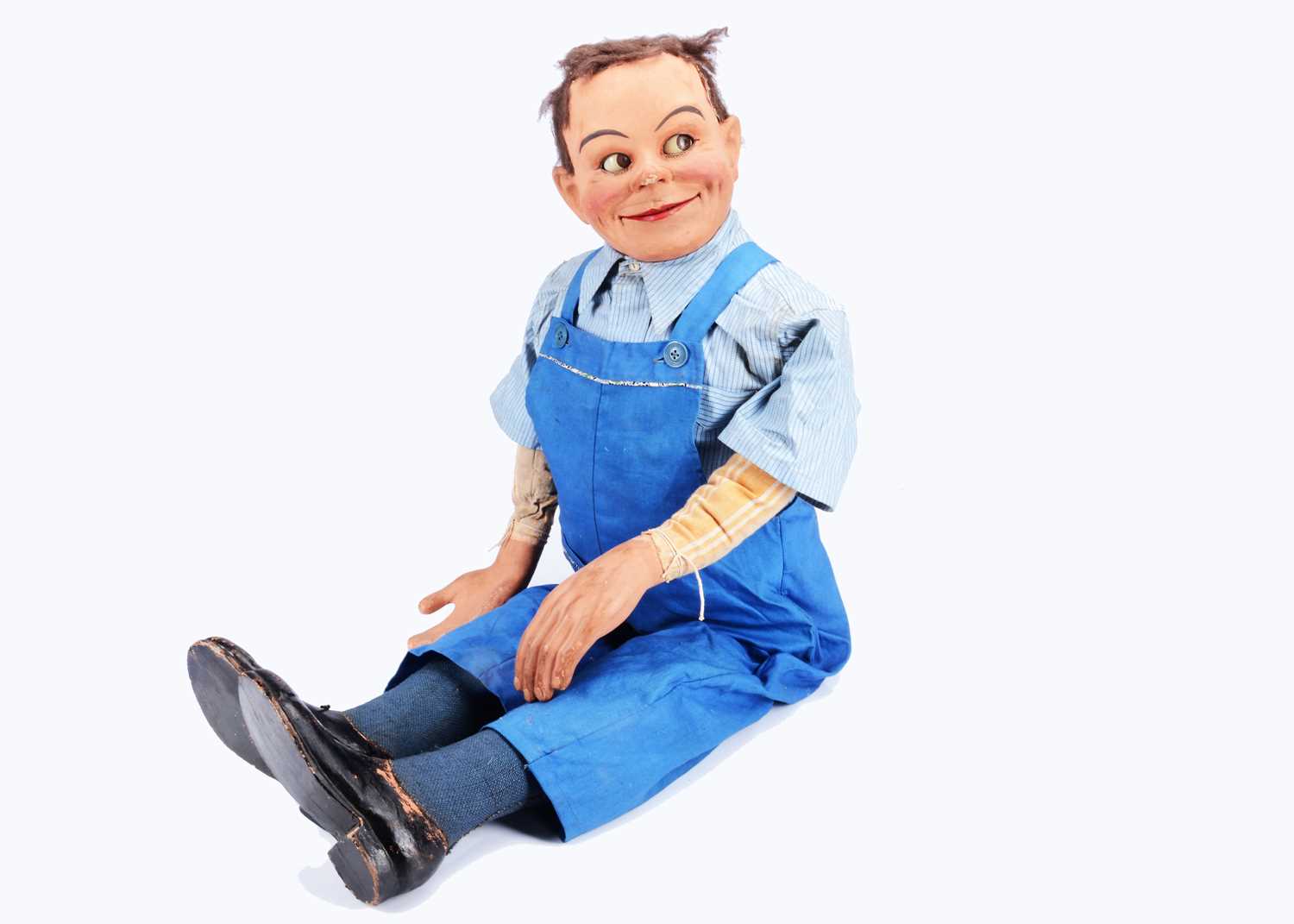 Lot 184 - A rare Leonard Insull papier-mâché ventriloquist boy puppet