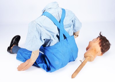 Lot 184 - A rare Leonard Insull papier-mâché ventriloquist boy puppet