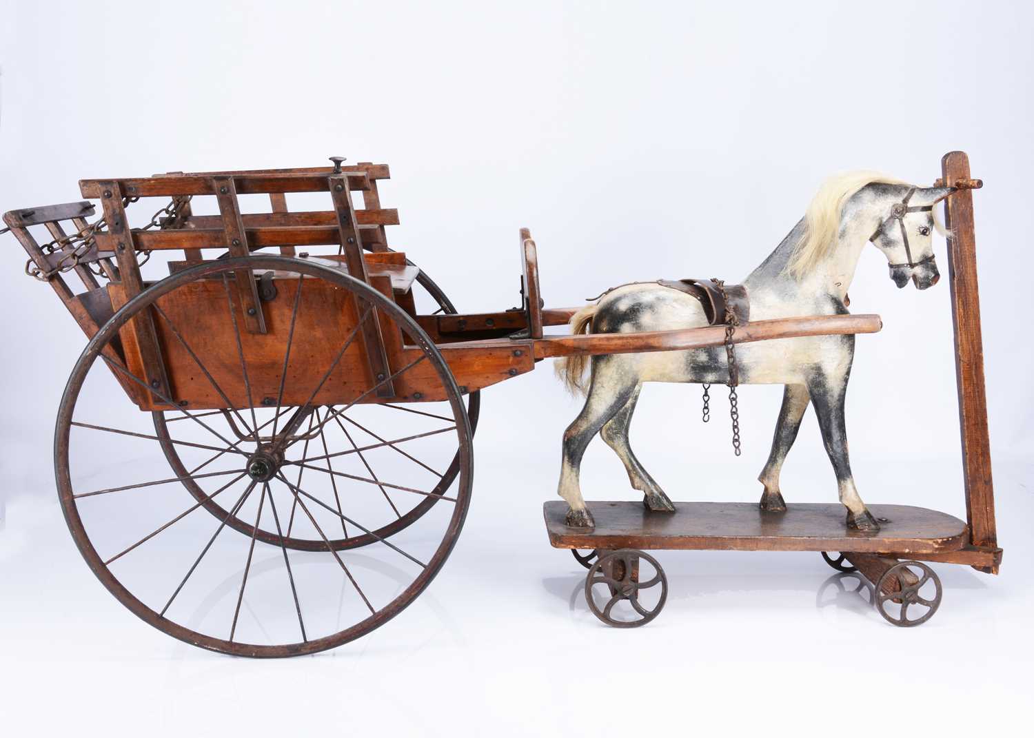 Lot 185 - A large G & J Line wooden ride on horse and hay cart