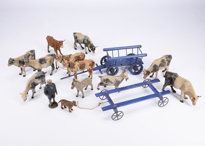 Lot 203 - Late 19th century papier-mâché farm animals and carts