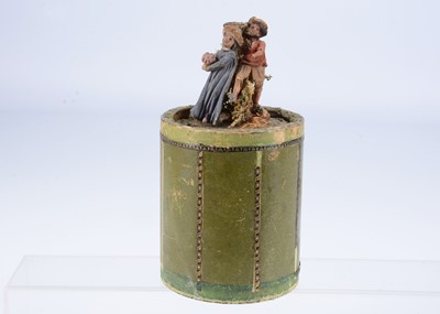 Lot 205 - A mid 19th century German carved wooden pastoral scene of a courting couple jack in the box