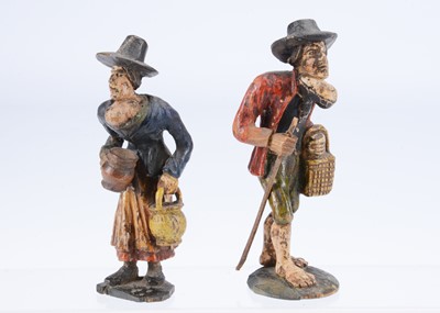 Lot 206 - An 19th century European carved wooden couple with Goitre growths
