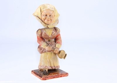 Lot 209 - A late 19th century Thüringen nurse nodder