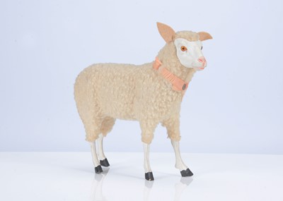 Lot 220 - A German composition and wood sheep candy container, circa 1910