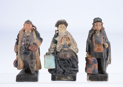 Lot 227 - Three late 19th century terracotta travellers spill holders