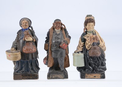 Lot 228 - Three late 19th century terracotta travellers spill holders