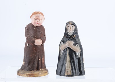 Lot 229 - A mid to late 19th century Thüringen monk and nun containers