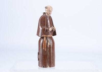 Lot 231 - An early to mid 19th century Oberammergau wooden figure of a monk with hidden chapel in robes