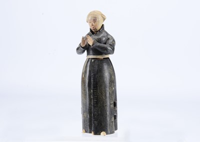 Lot 232 - An early to mid 19th century Oberammergau wooden figure of a nun with hidden chapel in robes