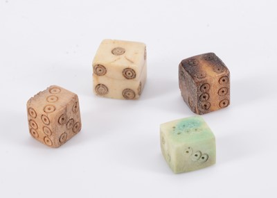 Lot 243 - Four ancient bone dice