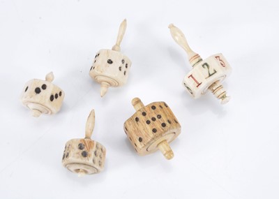 Lot 246 - Five 19th century bone teetotums